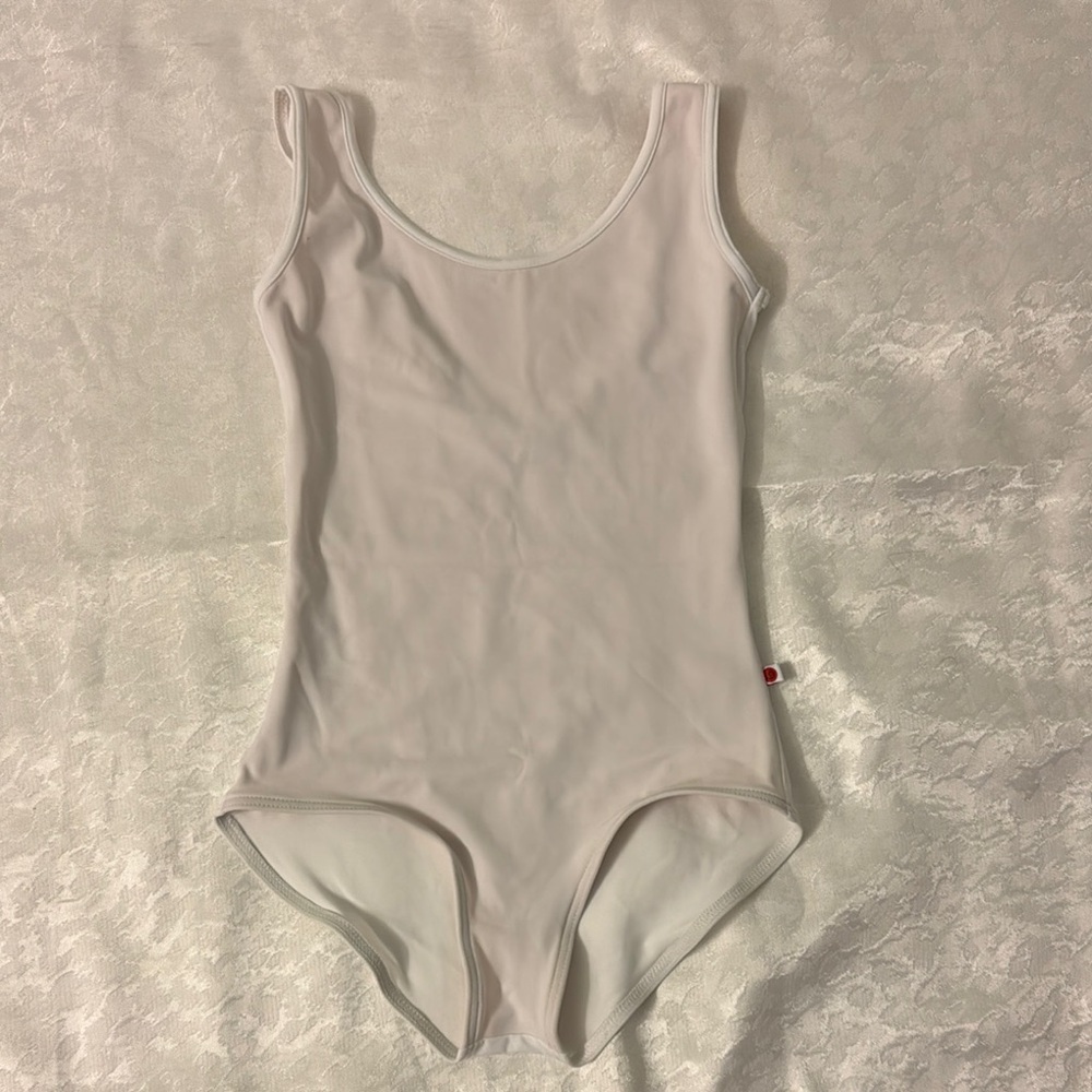 Yumiko white leotard, New without tag,fully front lining. Size S. NWOT.